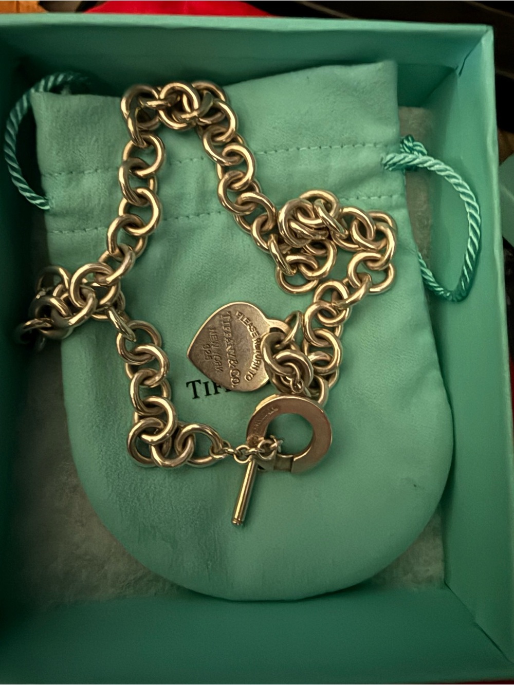 Tiffany & Co. Sterling Silver Heart Tag Charm Bracelet on Signature Blue